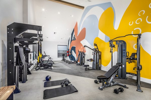 Fitness center with modern equipment at Silo Apartments