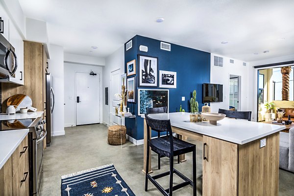 Sleek modern kitchen with stainless steel appliances at Silo Apartments