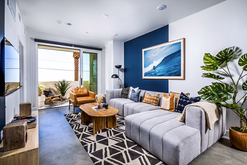 Spacious living room with modern furnishings in Silo Apartments, a Greystar luxury apartment community