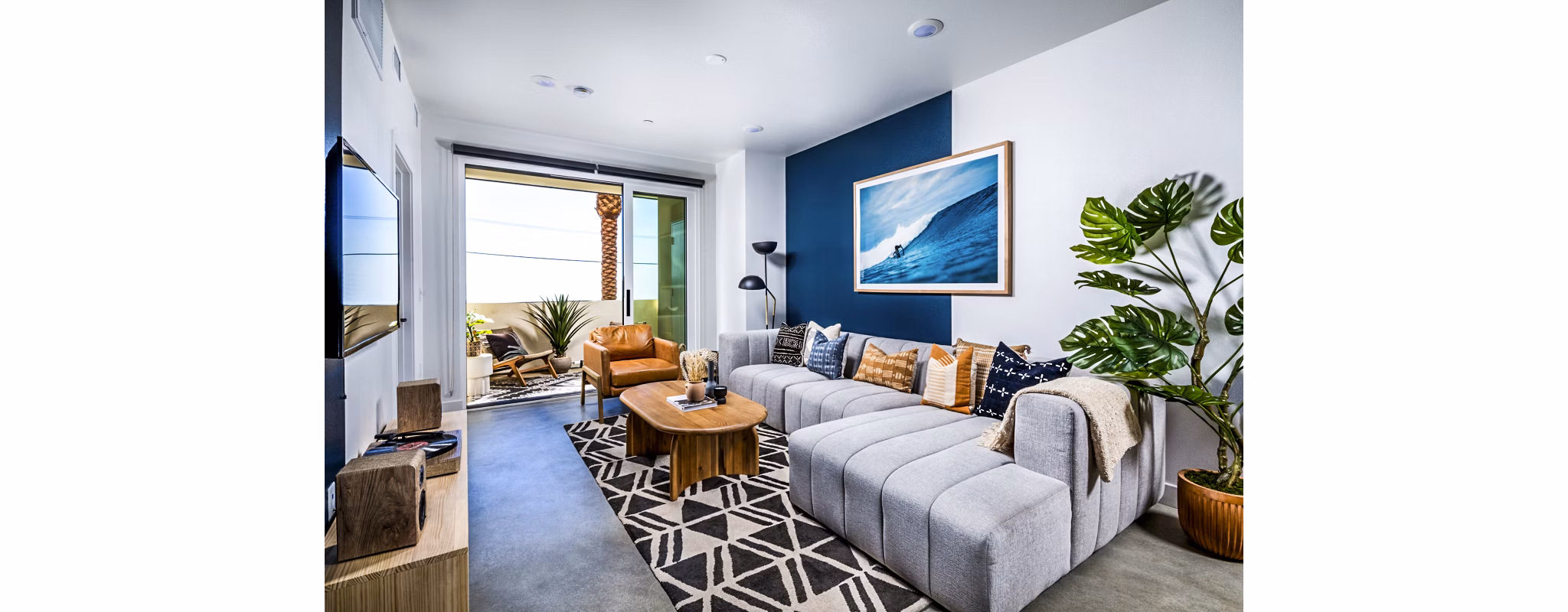 Spacious living room with modern furnishings in Silo Apartments, a Greystar luxury apartment community
