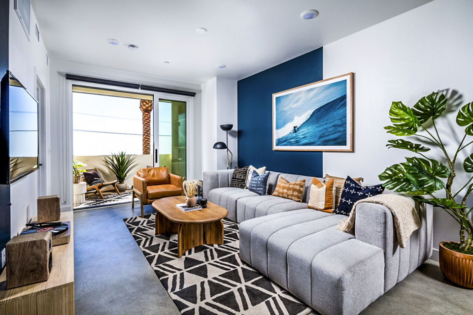 Spacious living room with modern furnishings in Silo Apartments, a Greystar luxury apartment community