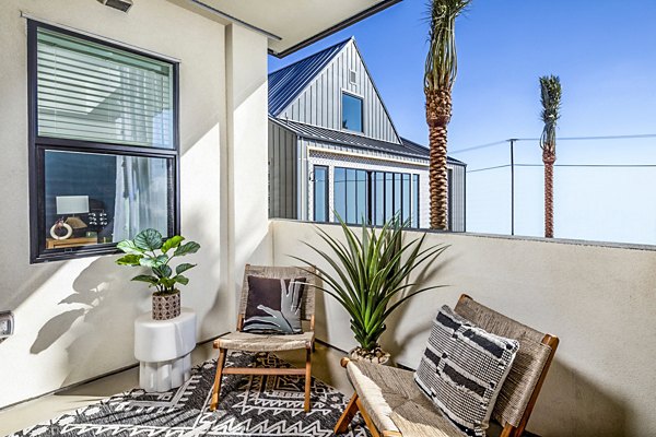 Modern balcony with city views at Silo Apartments