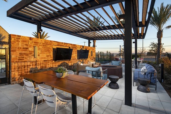 Relaxing patio with stylish seating at Silo Apartments