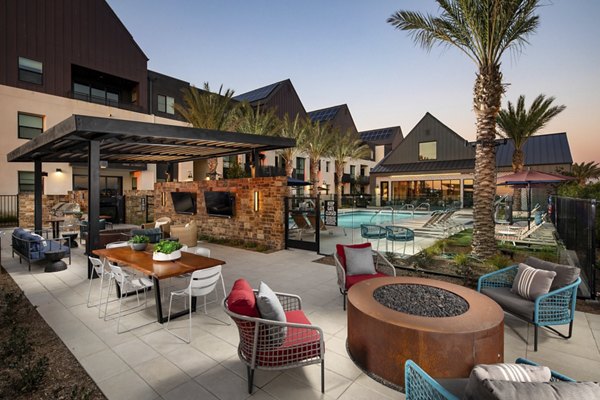 Cozy fire pit setting at Silo Apartments luxury community Ideal for evening gatherings, enhancing outdoor living experience
