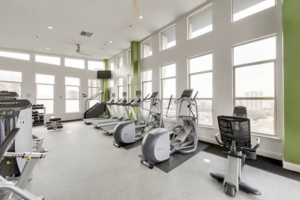 fitness center at McKinney Uptown Apartments