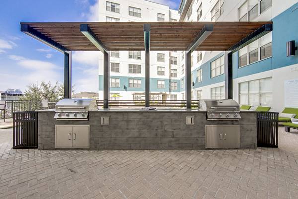 grill area at McKinney Uptown Apartments