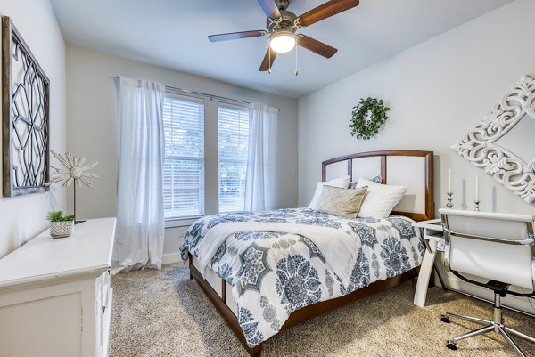 Spacious bedroom with modern decor at Ventura Ridge Apartments