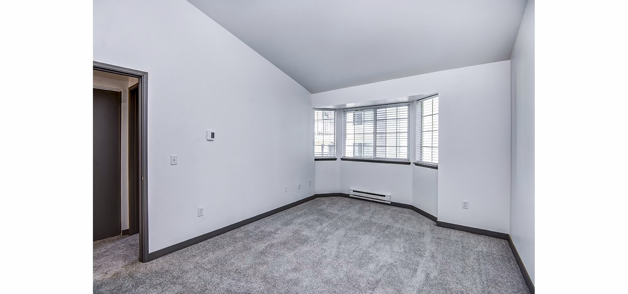 Modern bedroom with elegant decor at Capitol Heights Apartments, luxury living space designed for comfort and style