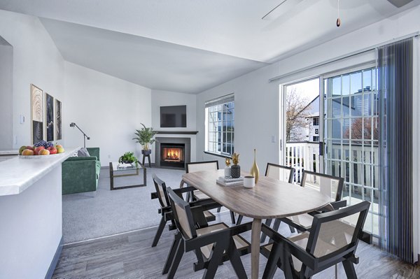 Dining room with modern furniture and stylish decor at Capitol Heights Apartments, perfect for entertaining in luxury surroundings