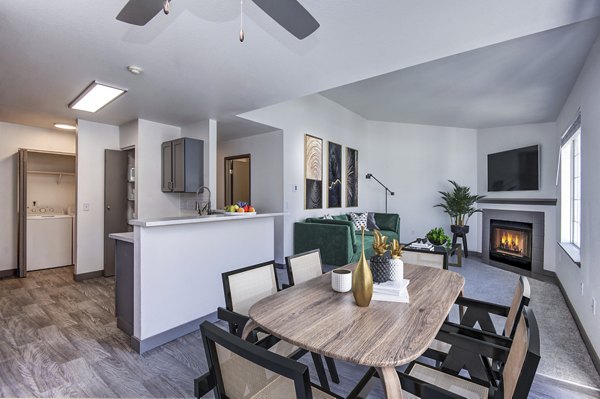 Dining room featuring elegant table settings at Capitol Heights Apartments