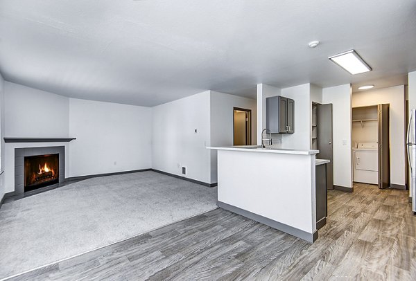 Spacious living room with modern decor in Capitol Heights Apartments