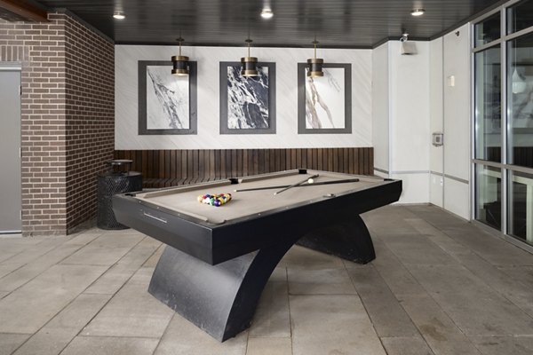 Clubhouse featuring contemporary design elements at River House Apartments, a luxury living community