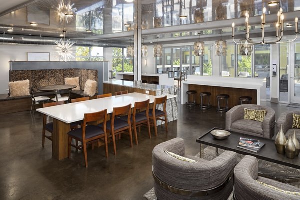 Modern clubhouse featuring contemporary design at River House Apartments offering luxurious social spaces