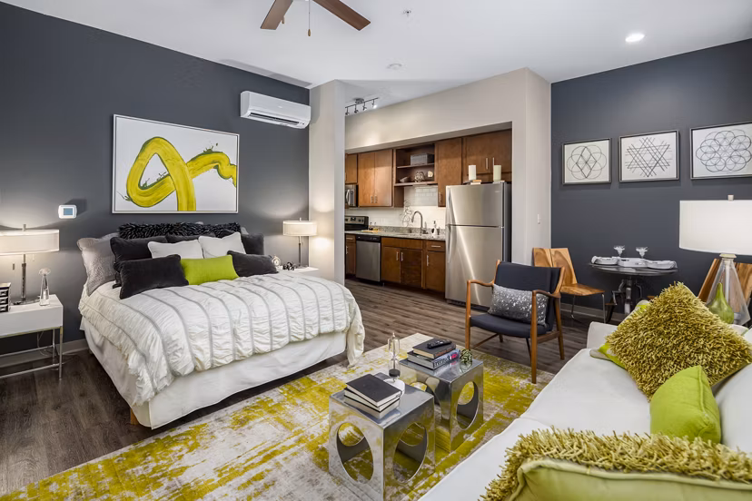 Modern studio bedroom with sleek furnishings at Terra House Apartments in luxury living community