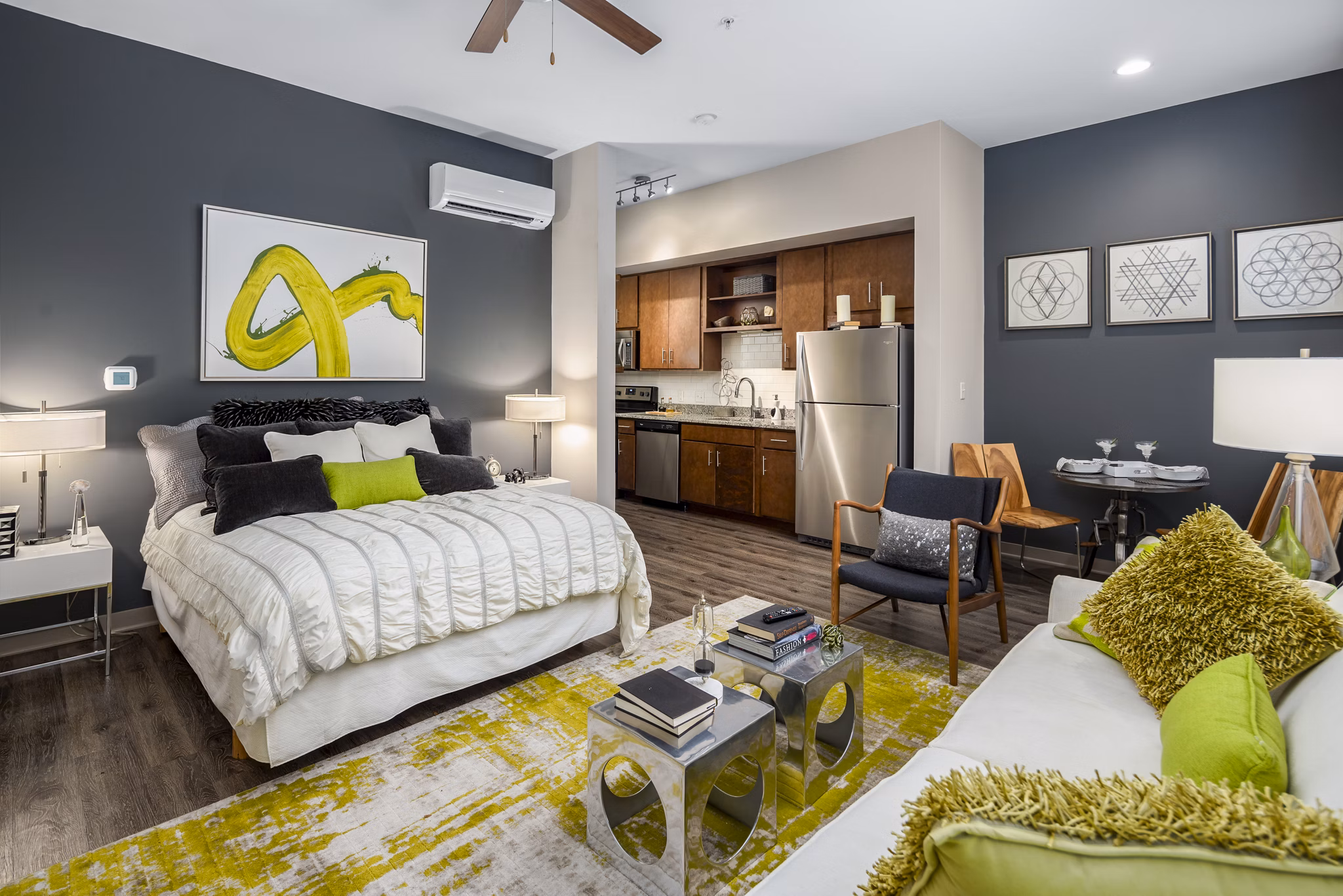 Modern studio bedroom with sleek furnishings at Terra House Apartments in luxury living community