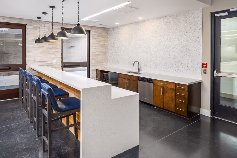 Clubhouse featuring modern decor and cozy seating at Terra House Apartments
