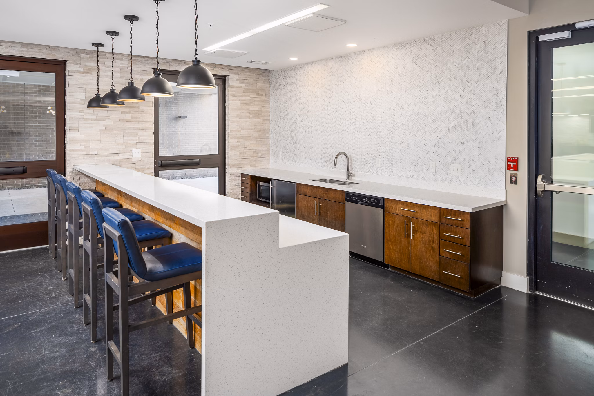 Clubhouse featuring modern decor and cozy seating at Terra House Apartments