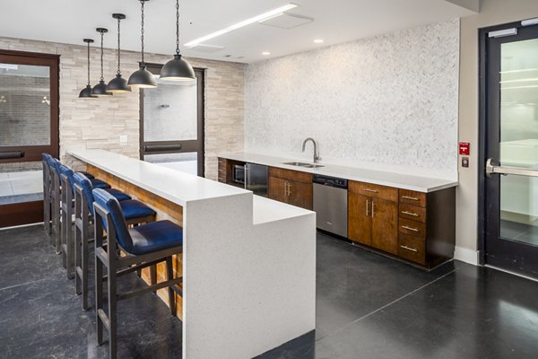 Clubhouse featuring modern decor and cozy seating at Terra House Apartments