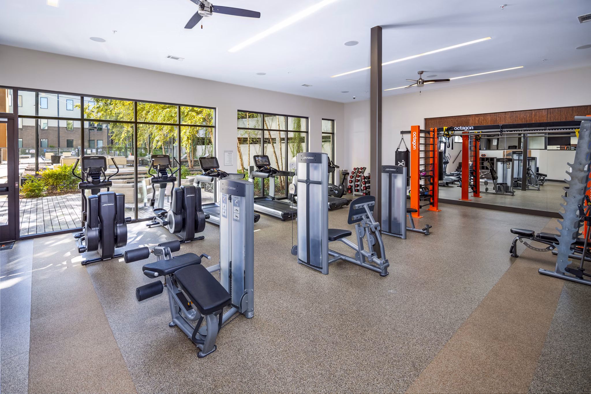 State-of-the-art fitness center with modern equipment at Terra House Apartments, ideal for active lifestyle residents