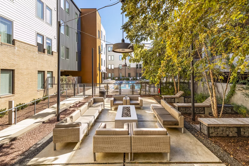 Cozy outdoor fire pit on patio at Terra House Apartments offers luxury social space in urban setting