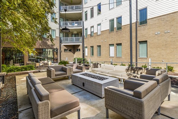 Cozy fire pit and patio area at Terra House Apartments