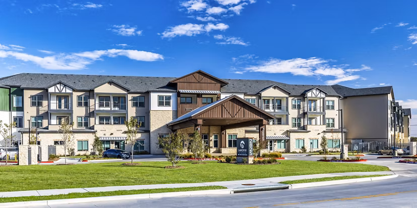 Larkspur at Creekside Apartments: Modern building showcasing luxury living