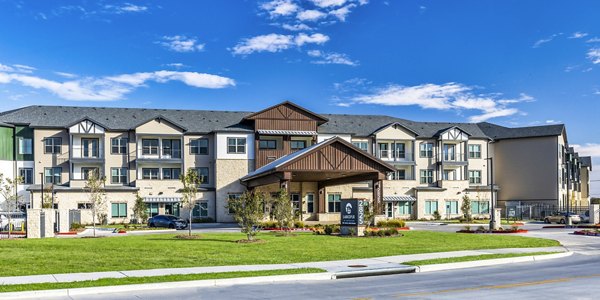 Larkspur at Creekside Apartments: Modern building showcasing luxury living