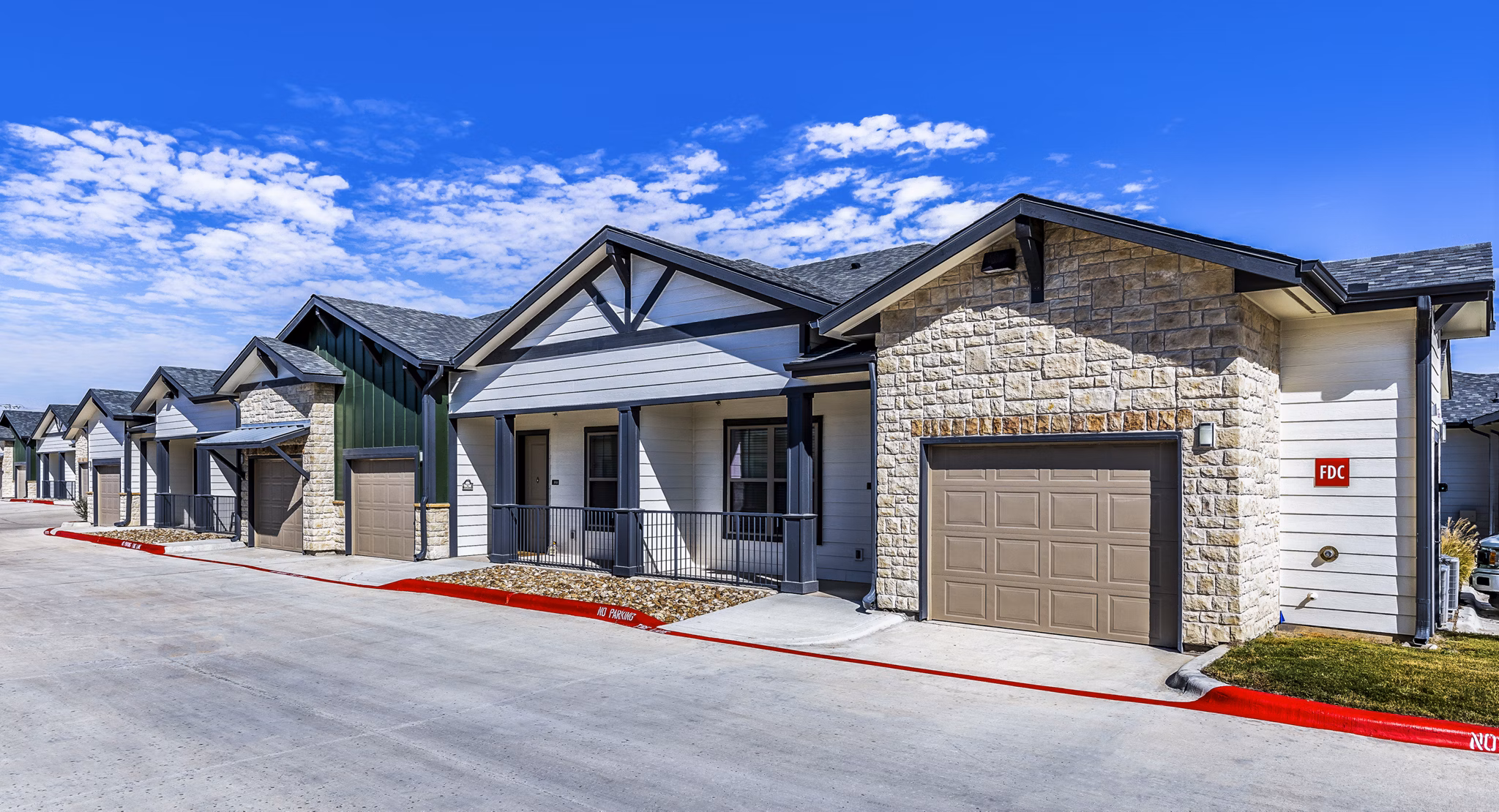 Larkspur at Creekside: Contemporary apartment building in serene setting