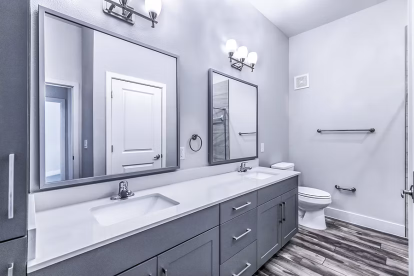 Modern bathroom featuring sleek fixtures at Larkspur at Creekside Apartments