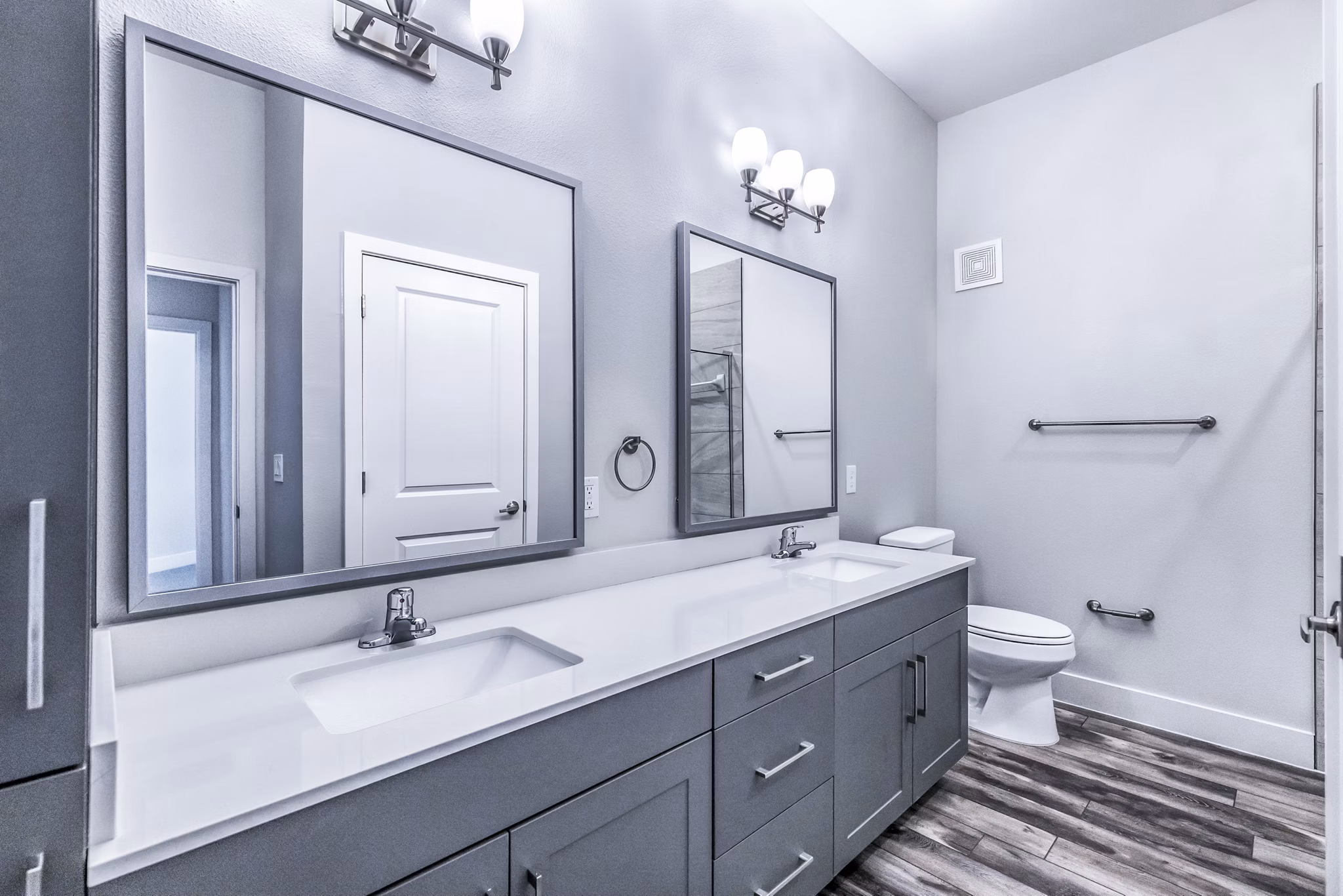 Modern bathroom featuring sleek fixtures at Larkspur at Creekside Apartments