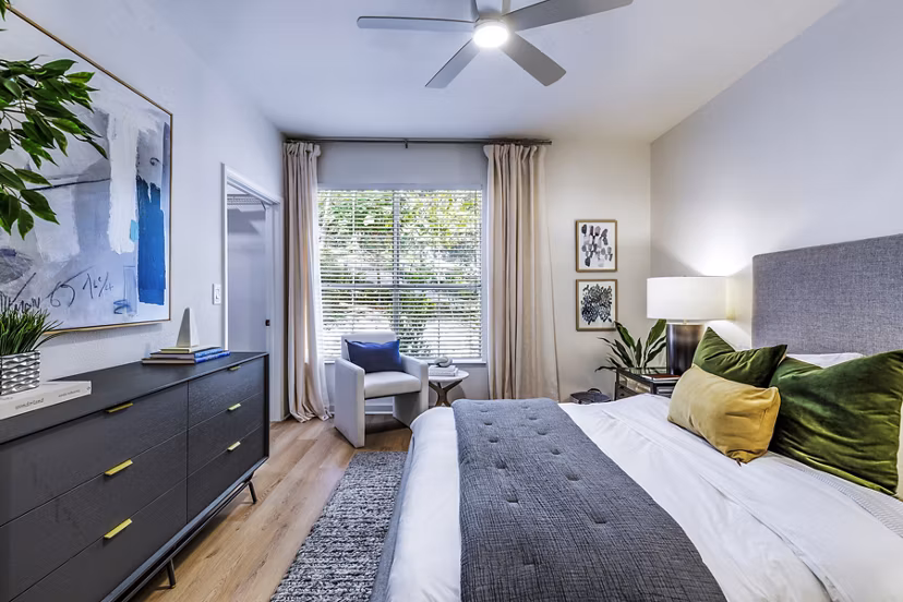 The Lola Apartments: Elegant bedroom with modern designs in a luxury community