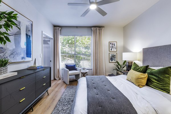 The Lola Apartments: Elegant bedroom with modern designs in a luxury community