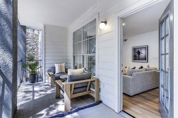 Stylish outdoor patio space at The Lola Apartments