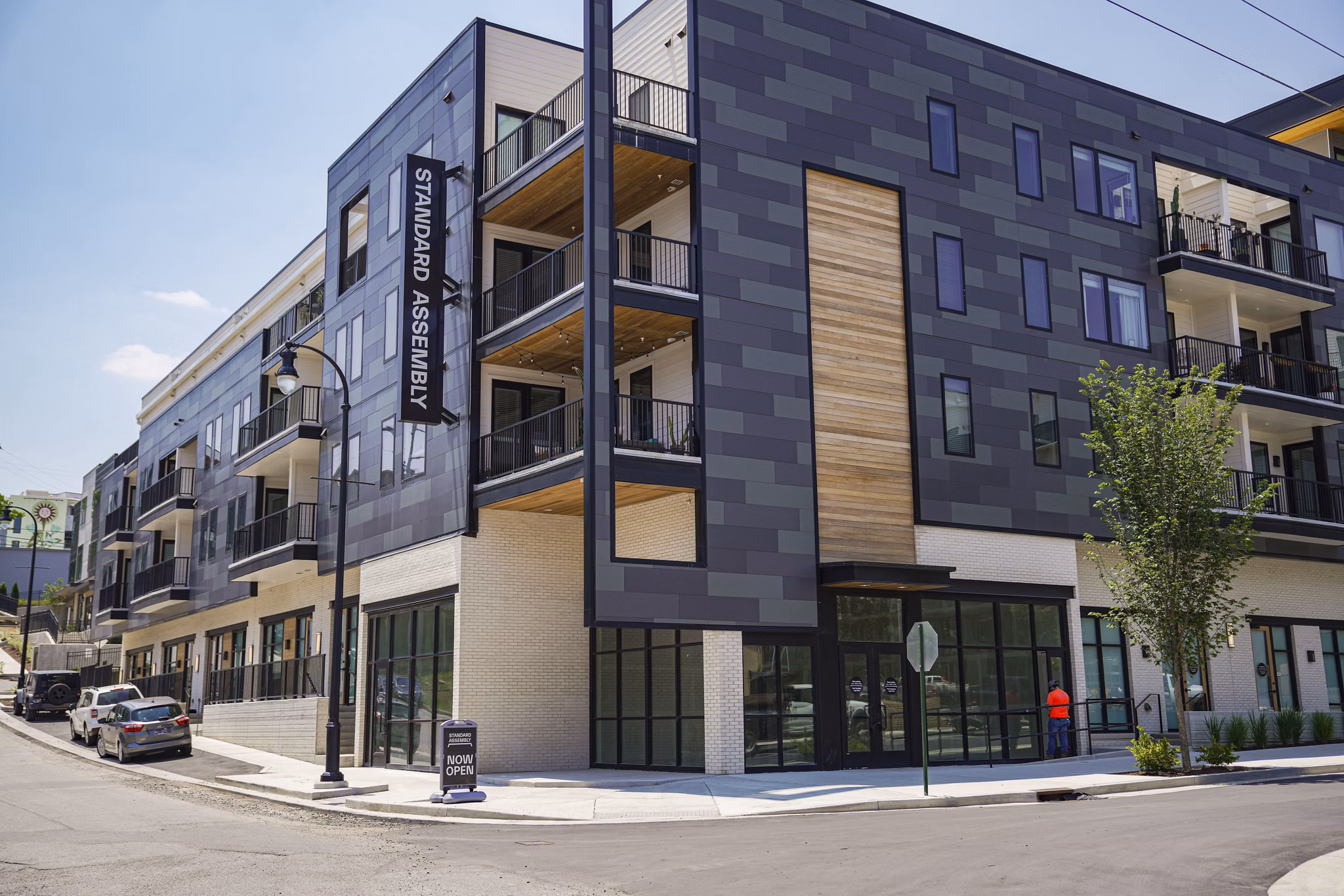 Standard Assembly: Contemporary luxury apartments with sleek design in vibrant city neighborhood, offering premier living experience