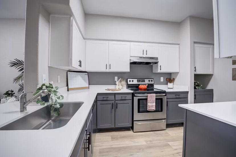 Modern kitchen featuring stainless steel appliances in Gateway at Tempe Apartments