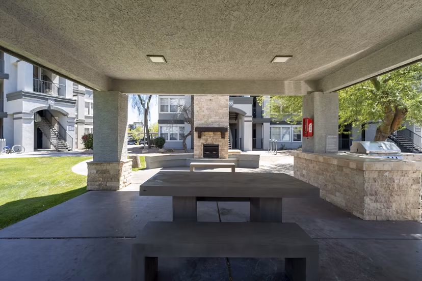 Chic patio with modern lounge furniture at Gateway at Tempe Apartments, perfect for relaxing or entertaining in this luxury community
