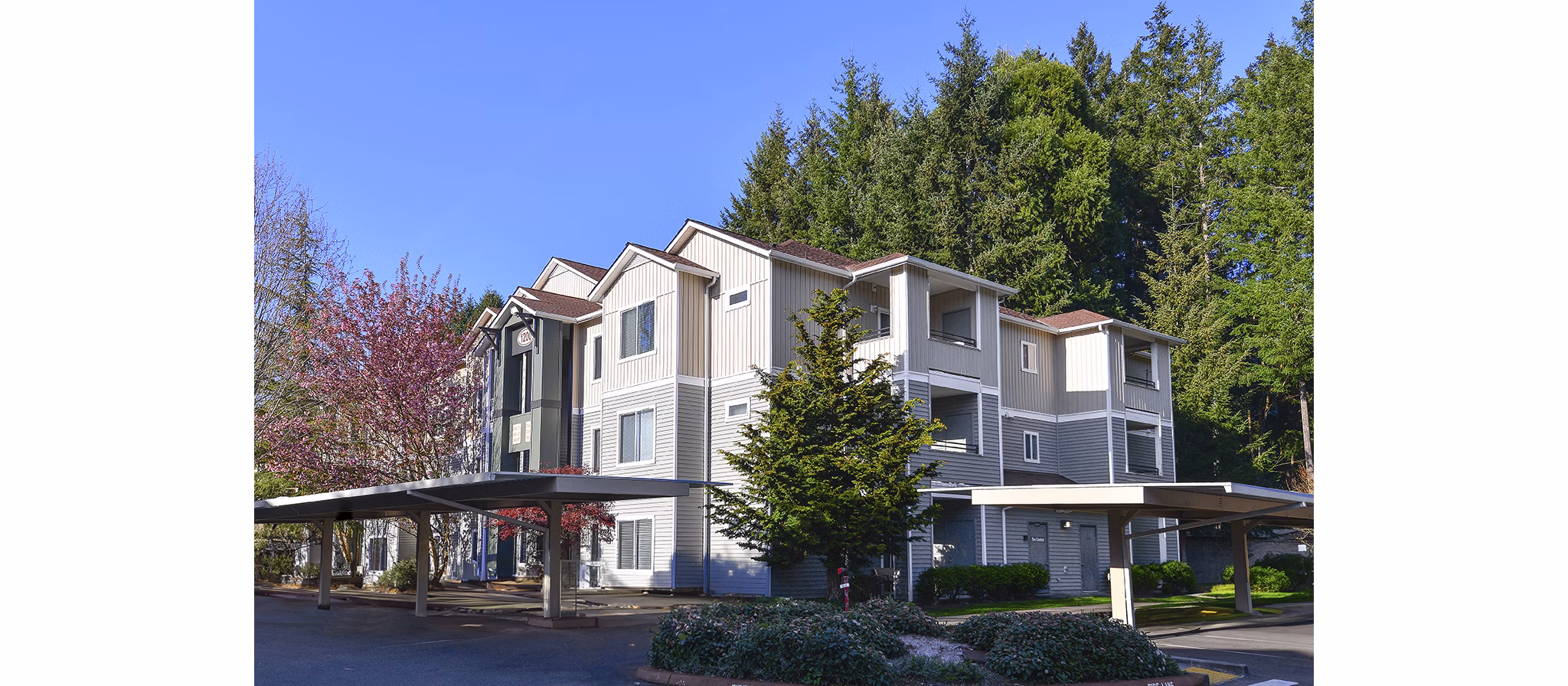 The Dakota Apartments: Elegant brick luxury apartments in an upscale neighborhood