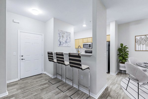 Spacious dining area with elegant decor at The Dakota Apartments entrance