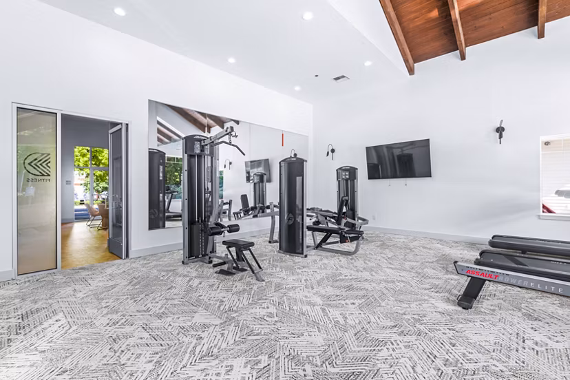 Fitness center with modern equipment at The Dakota Apartments, perfect for residents seeking a luxurious workout experience