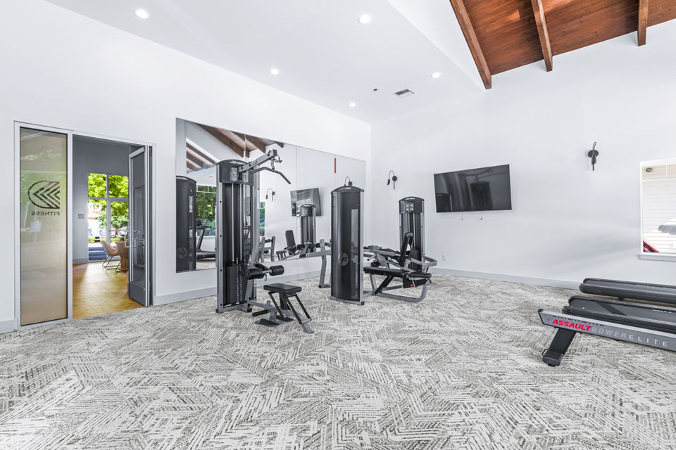 Fitness center with modern equipment at The Dakota Apartments, perfect for residents seeking a luxurious workout experience