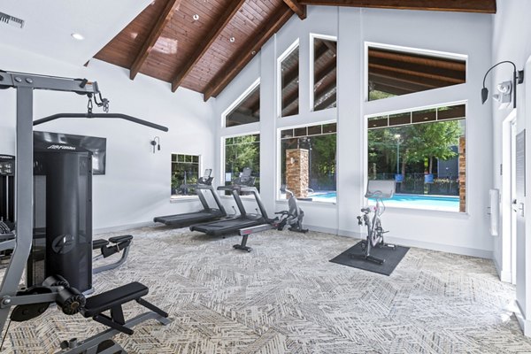 State-of-the-art fitness center at The Dakota Apartments with modern equipment for residents' workouts
