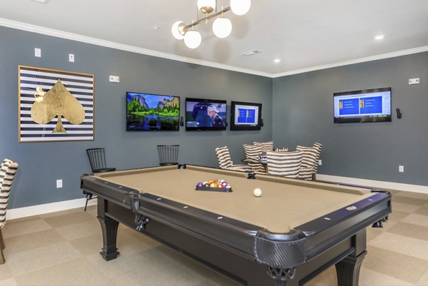 game room at Ivy Point Klein Apartments 