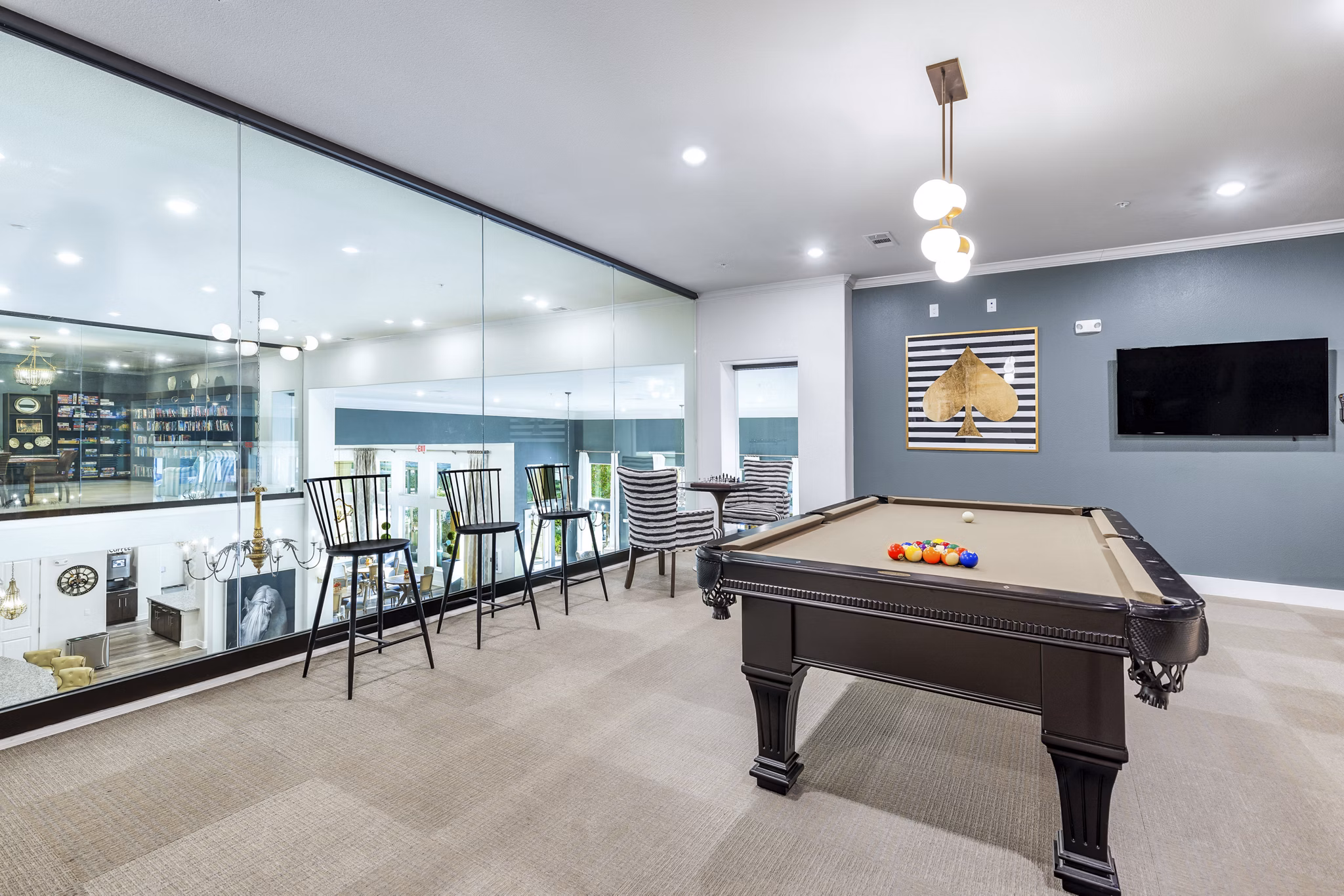 clubhouse game room at Ivy Point Klein Apartments