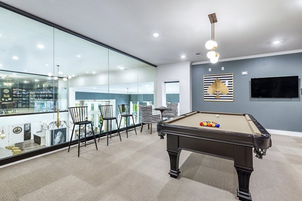 clubhouse game room at Ivy Point Klein Apartments