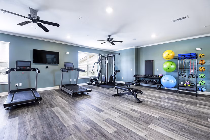 fitness center at Ivy Point Klein Apartments
