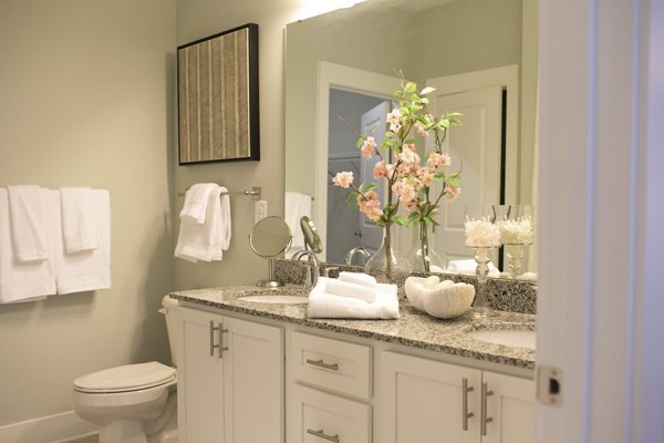 Luxurious bathroom with modern fixtures at The Peak at Nichols Plaza Apartments