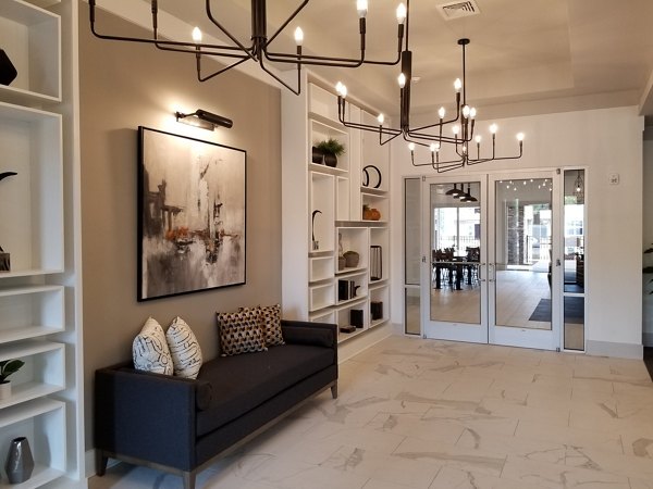 Clubhouse with elegant seating and modern decor at The Peak at Nichols Plaza luxury apartments