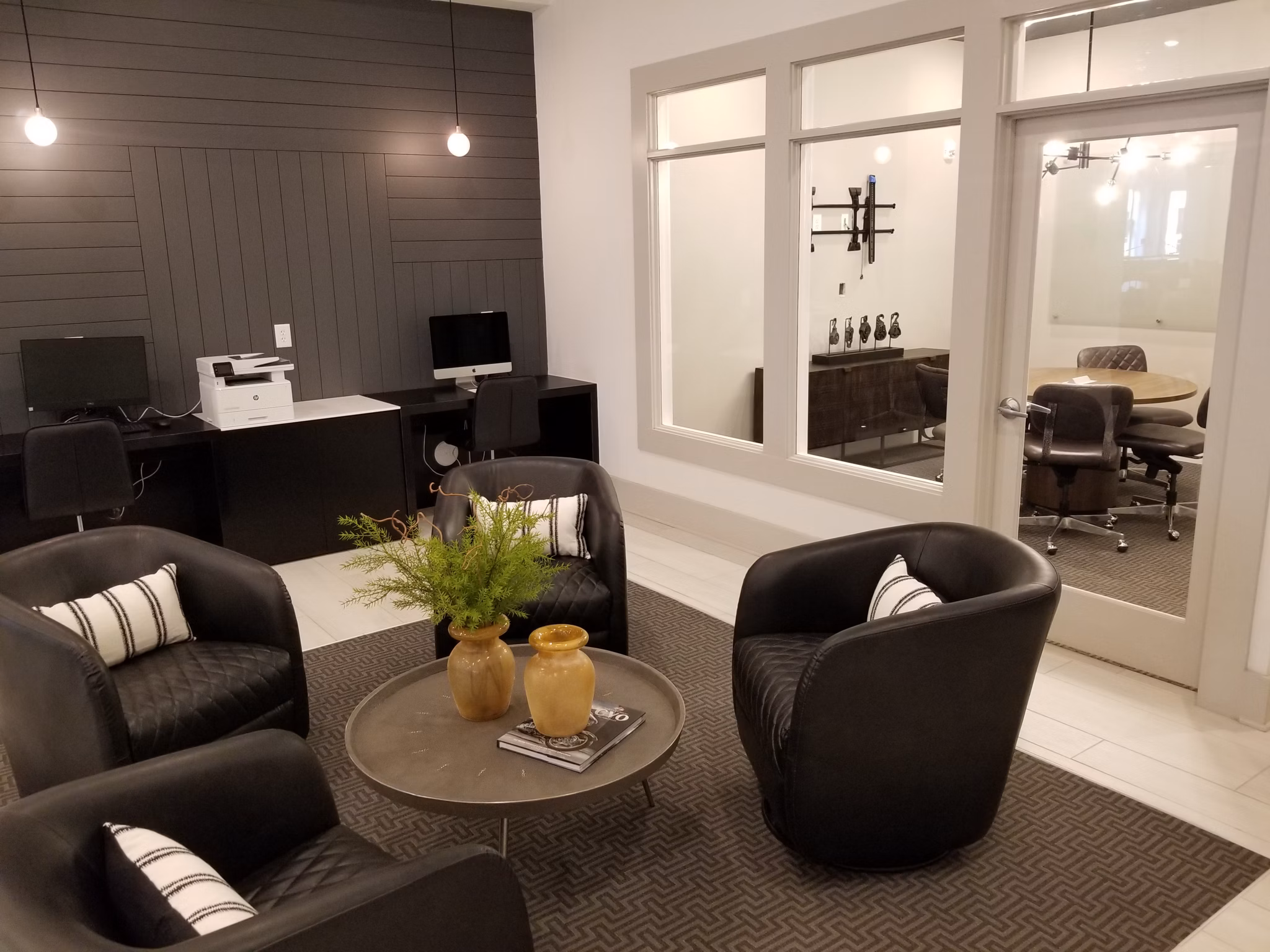 Luxurious clubhouse with modern furnishings at The Peak at Nichols Plaza Apartments