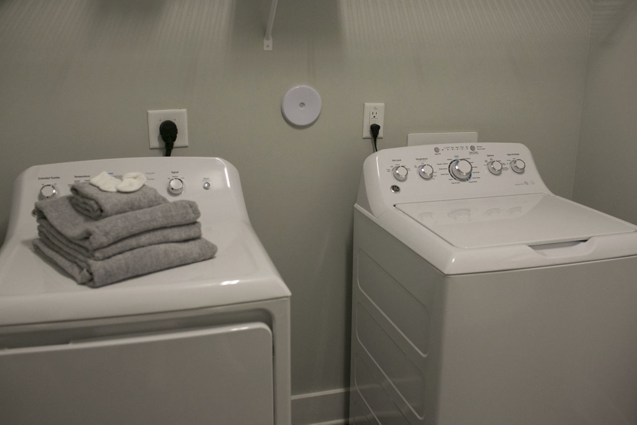 Laundry room at The Peak At Nichols Plaza