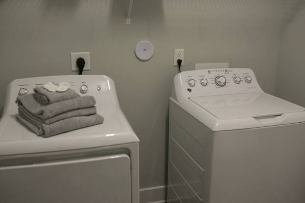 laundry room at The Peak at Nichols Plaza Apartments
